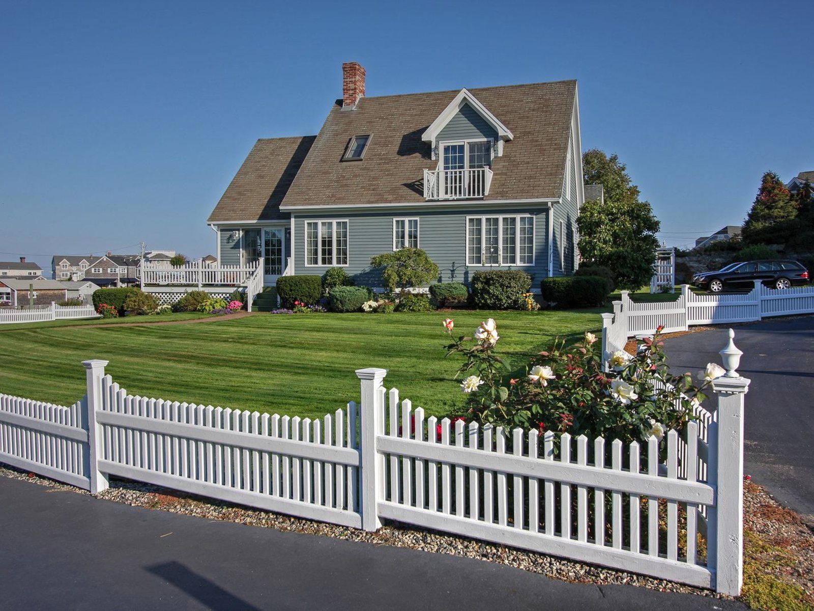 White fence — green film gone — after cleaning